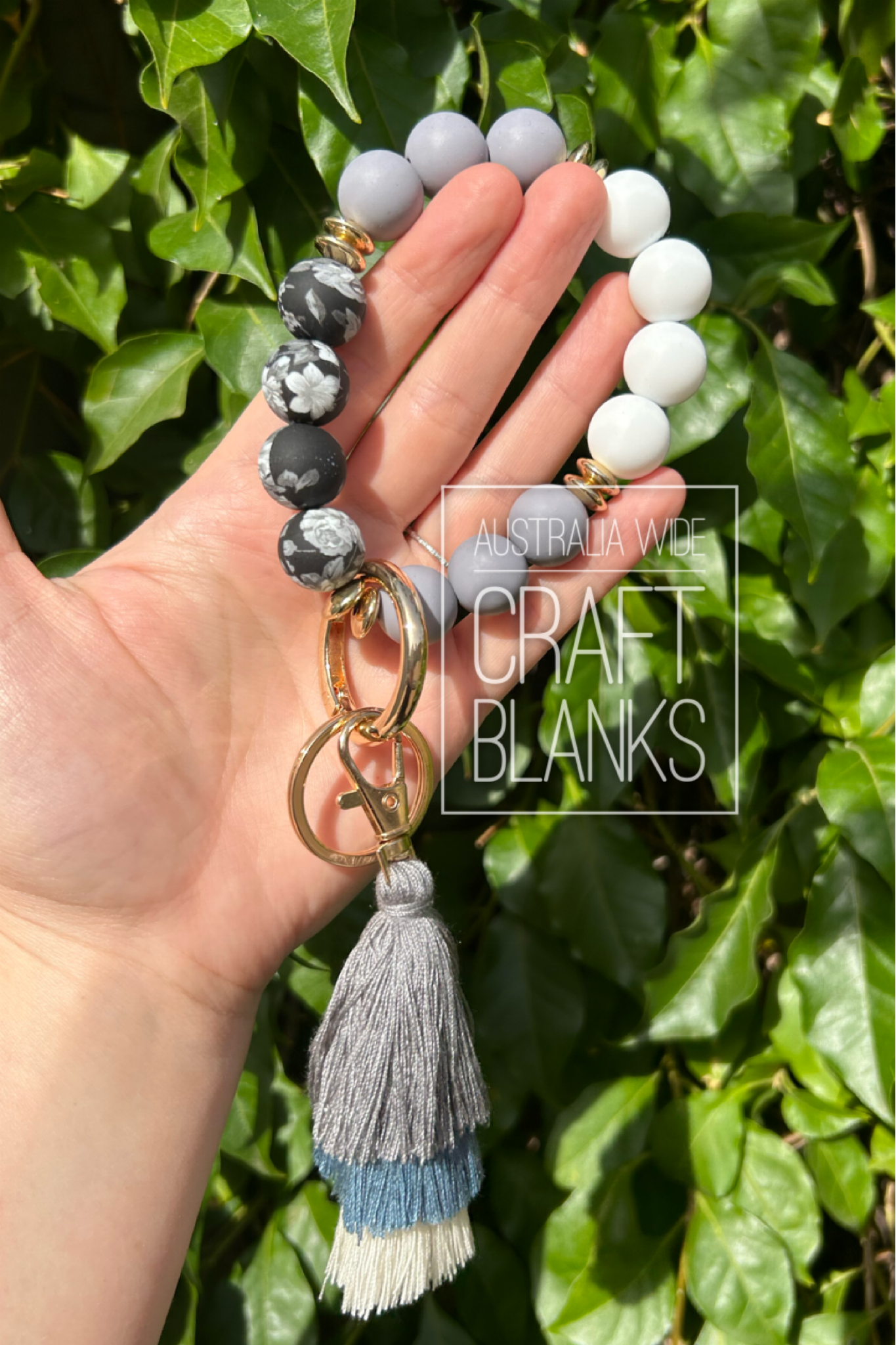 Keyring - Silicone bead Floral style wristlet w/ tassle