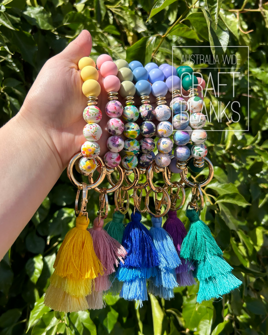 Keyring - Silicone bead Floral style wristlet w/ tassle